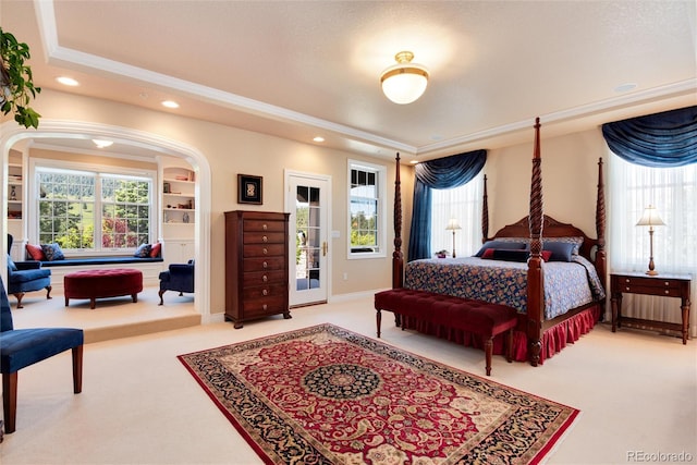 carpeted bedroom featuring ornamental molding