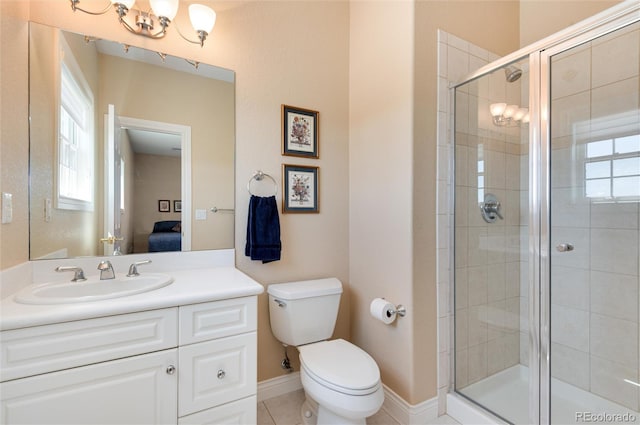 bathroom with walk in shower, tile patterned flooring, vanity, and toilet