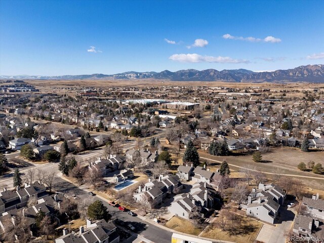 drone / aerial view featuring a mountain view and a residential view