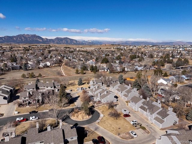 drone / aerial view featuring a mountain view and a residential view