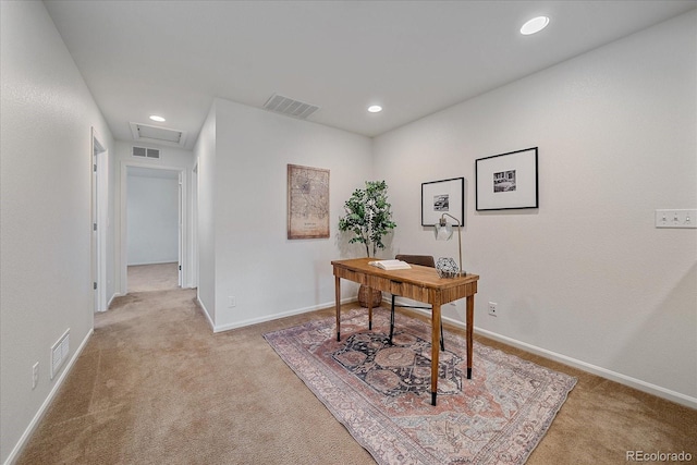 home office with recessed lighting, light colored carpet, visible vents, attic access, and baseboards