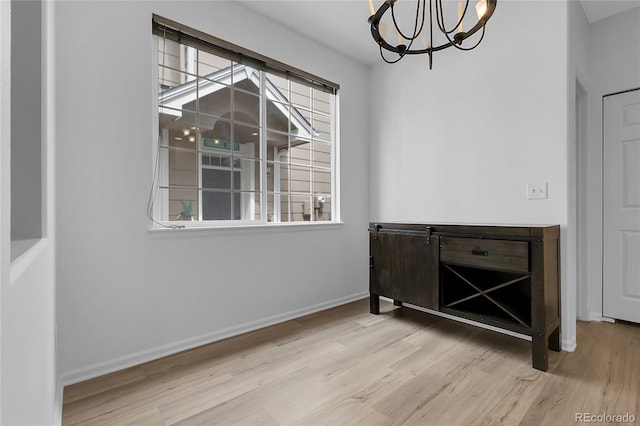 1409 Carlyle Park Cir, Highlands Ranch, CO 80129 - unfurnished dining area with a chandelier and wood finished floors