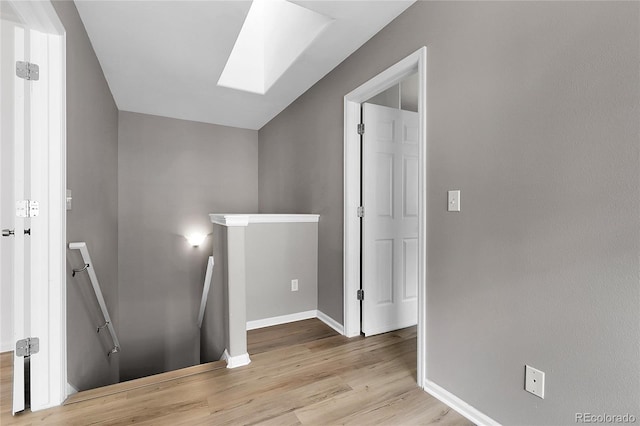 1409 Carlyle Park Cir, Highlands Ranch, CO 80129 - stairs with a skylight and wood finished floors