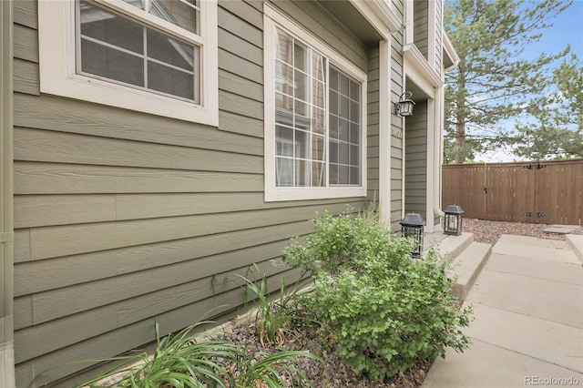 1409 Carlyle Park Cir, Highlands Ranch, CO 80129 - view of side of property featuring a patio area