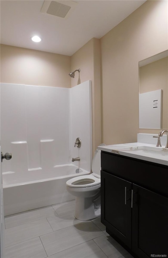 full bath with washtub / shower combination, visible vents, vanity, and toilet