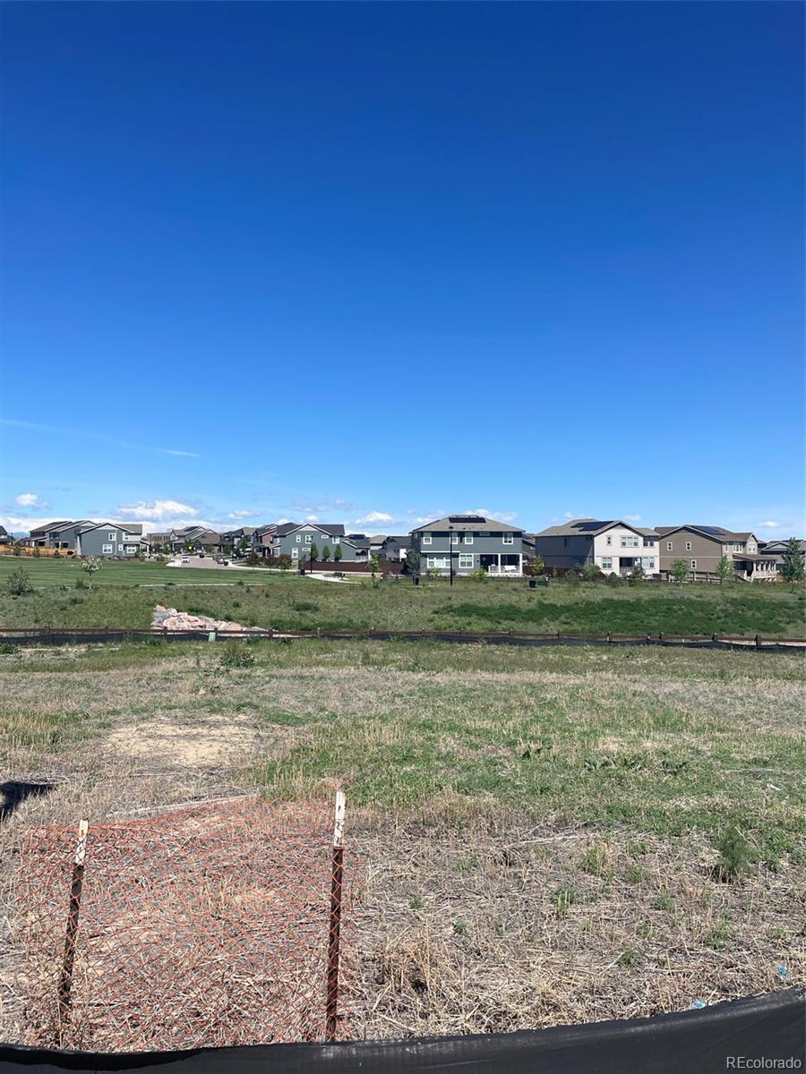 14583 Hudson Way, Thornton, CO 80602 - view of yard featuring a residential view