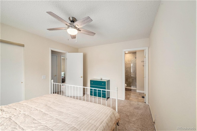 3756 S Mission Pkwy, Aurora, CO 80013 - bedroom with a closet, carpet floors, a textured ceiling, ensuite bath, and a ceiling fan
