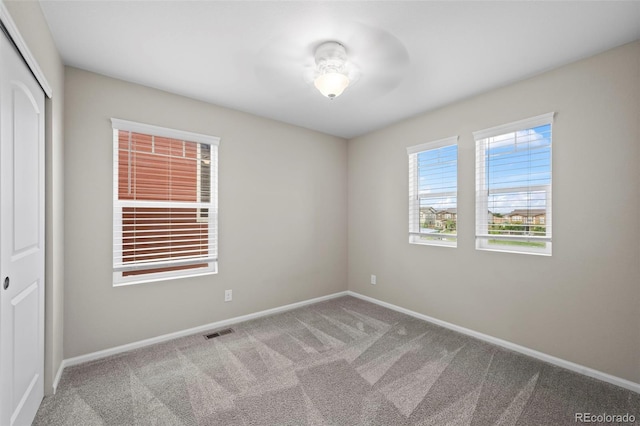 13870 Ash Cir, Brighton, CO 80602 - empty room featuring carpet flooring