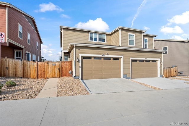 13870 Ash Cir, Brighton, CO 80602 - traditional-style house with concrete driveway and an attached garage