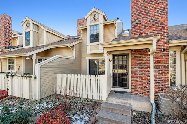 view of front of house featuring central AC