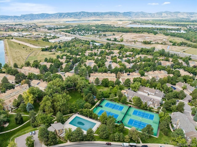 drone / aerial view featuring a mountain view