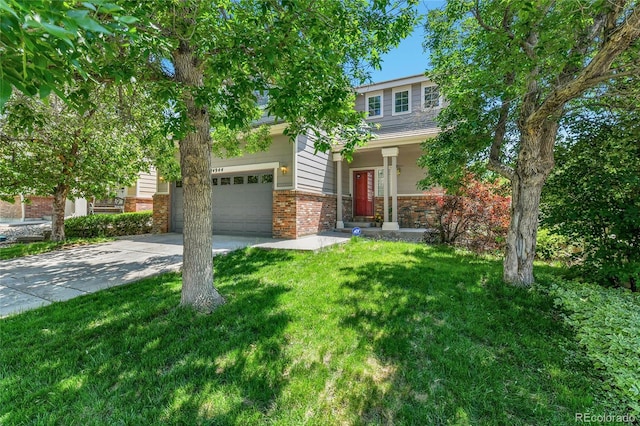 14944 E Archer Cir, Aurora, CO 80012 - obstructed view of property featuring driveway, a front yard, brick siding, and a garage