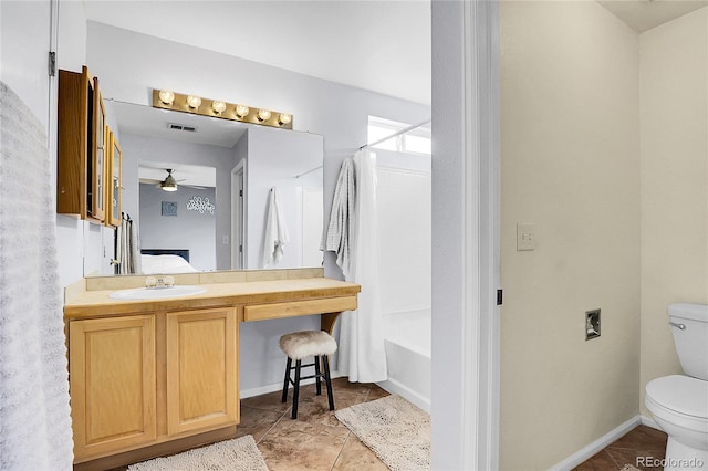 14944 E Archer Cir, Aurora, CO 80012 - full bath with toilet, a ceiling fan, shower / tub combo with curtain, ensuite bathroom, and vanity