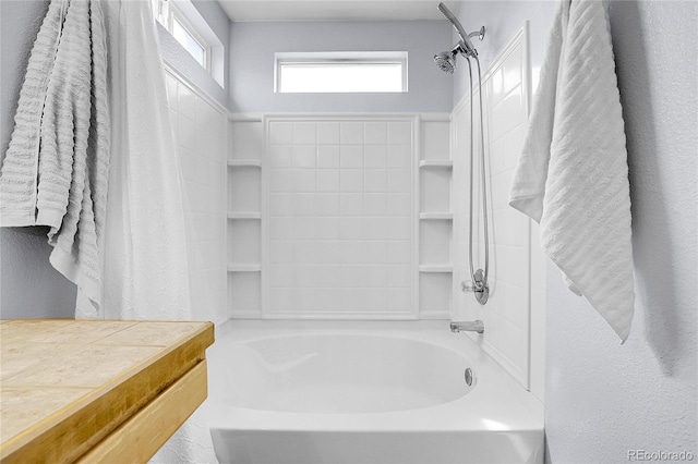 14944 E Archer Cir, Aurora, CO 80012 - full bath featuring washtub / shower combination and a textured wall
