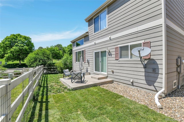 14944 E Archer Cir, Aurora, CO 80012 - back of property featuring a patio