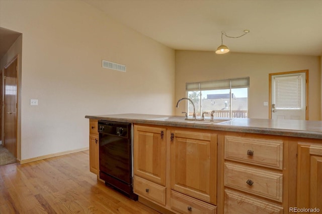 kitchen featuring light brown cabinetry, light wood-type flooring, sink, black dishwasher, and lofted ceiling