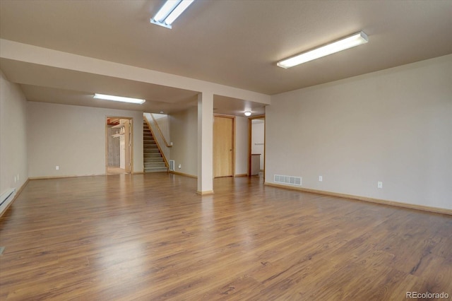 unfurnished room featuring wood-type flooring