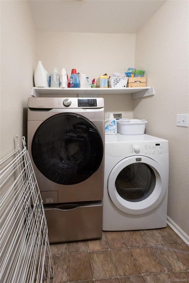 washroom with washer and clothes dryer