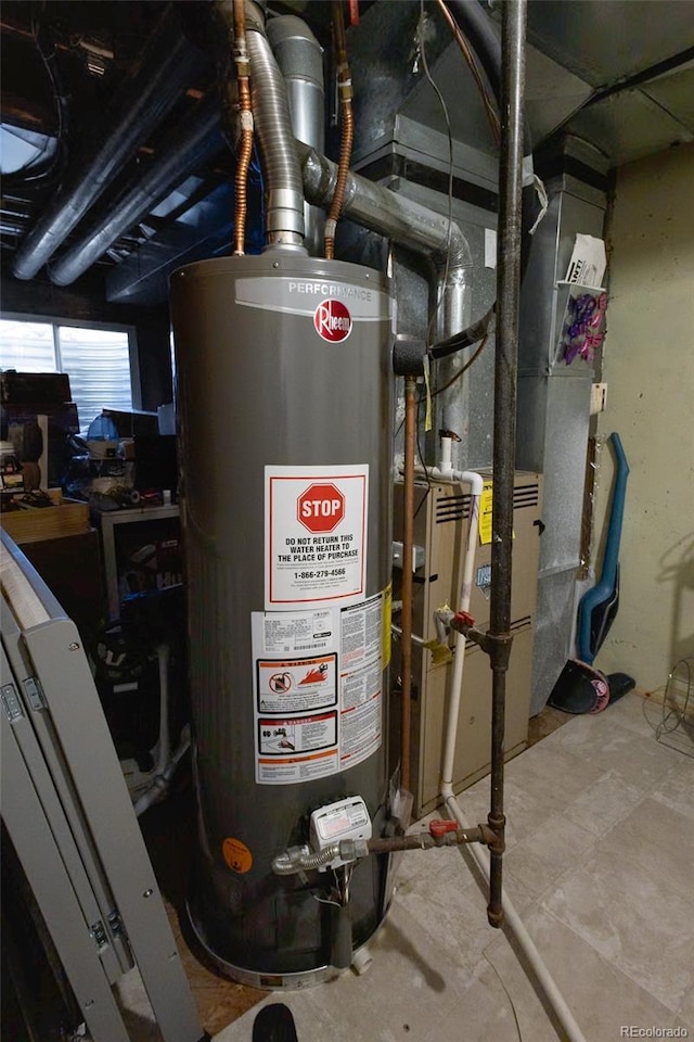 utility room with water heater