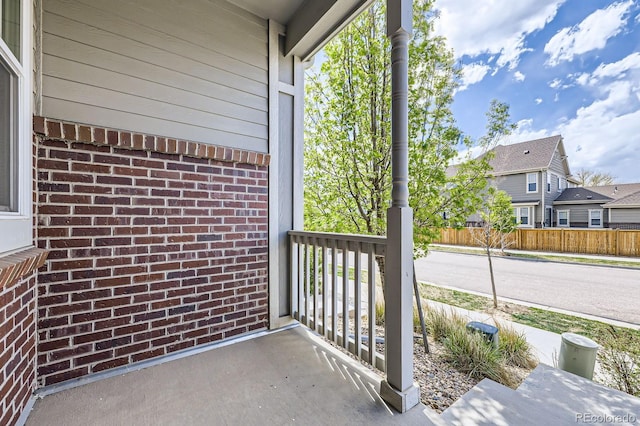balcony featuring a porch