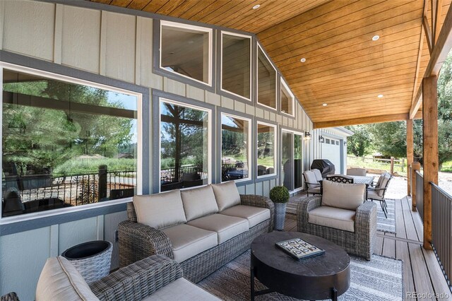 2230 S Platte River Rd, Sedalia, CO 80135 - wooden terrace featuring an outdoor hangout area and outdoor dining space