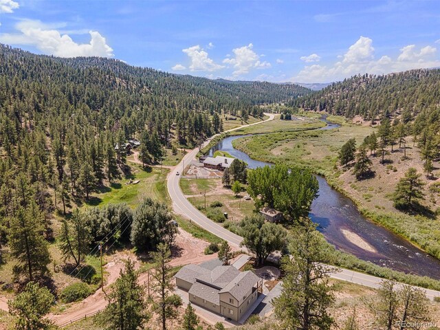 2230 S Platte River Rd, Sedalia, CO 80135 - aerial view featuring a water view and a wooded view