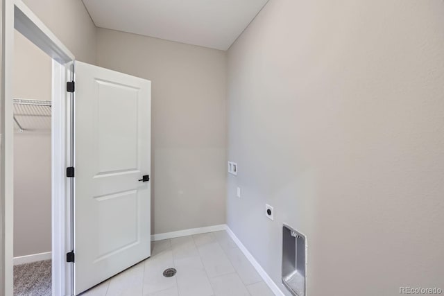 9627 Browns Peak Cir, Littleton, CO 80125 - washroom featuring washer hookup, hookup for an electric dryer, and light tile patterned floors