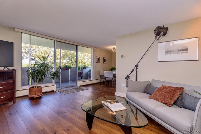 1085 N Lafayette St Unit 704, Denver, CO 80218 - living room featuring hardwood / wood-style floors, baseboard heating, and floor to ceiling windows