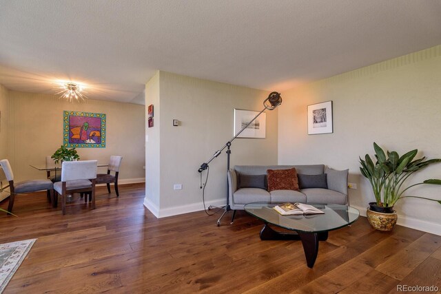1085 N Lafayette St Unit 704, Denver, CO 80218 - sitting room featuring wood finished floors and baseboards