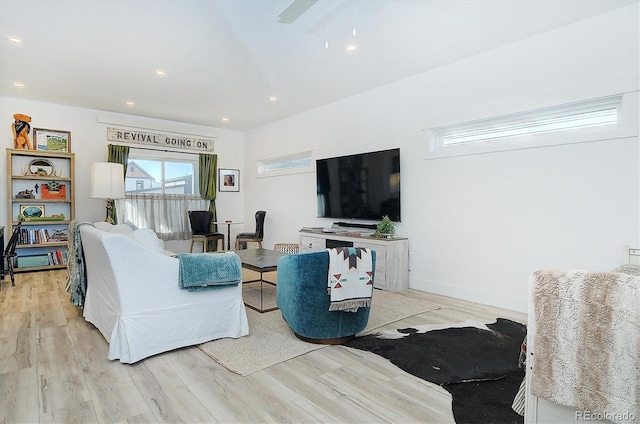 living room with light hardwood / wood-style floors