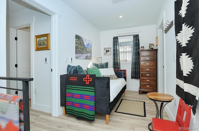 bedroom featuring light hardwood / wood-style flooring