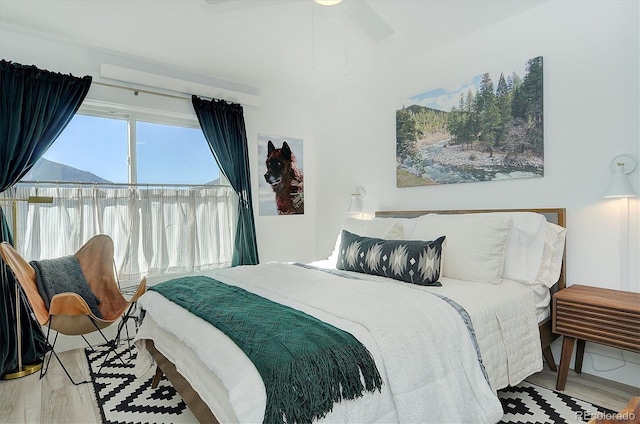 bedroom with light hardwood / wood-style floors