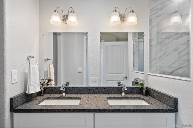 bathroom with dual bowl vanity