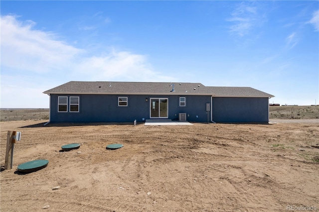 rear view of house featuring a patio