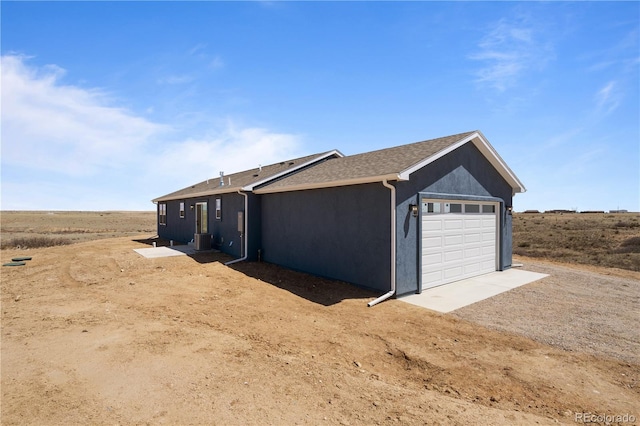 garage with a rural view