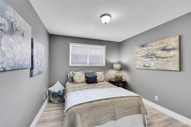 7902 Meade St Unit A10, Westminster, CO 80030 - bedroom with baseboards and light wood-style flooring