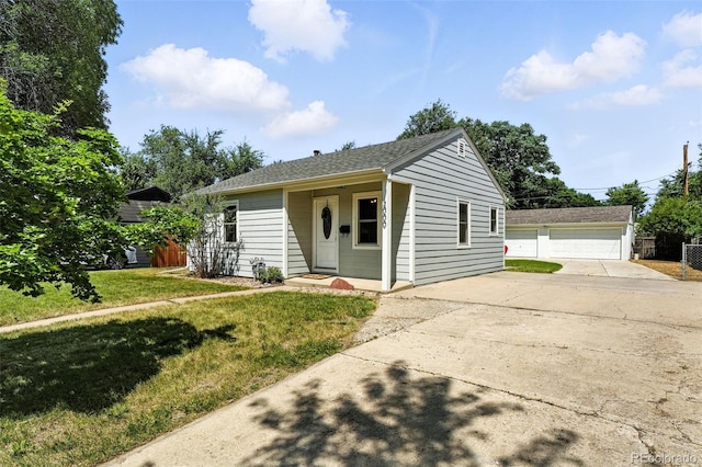 2000 S King St, Denver, CO 80219 - ranch-style home with a front yard, a garage, and an outbuilding