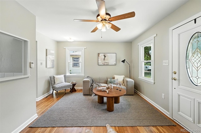 2000 S King St, Denver, CO 80219 - entrance foyer with healthy amount of natural light, wood finished floors, and a ceiling fan