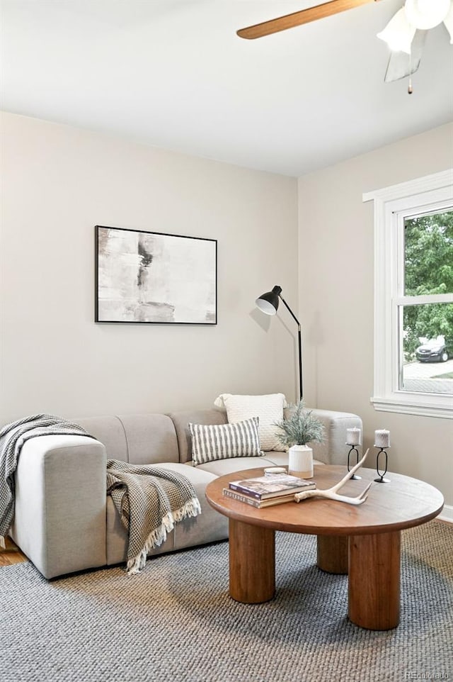 2000 S King St, Denver, CO 80219 - living room featuring a ceiling fan and carpet