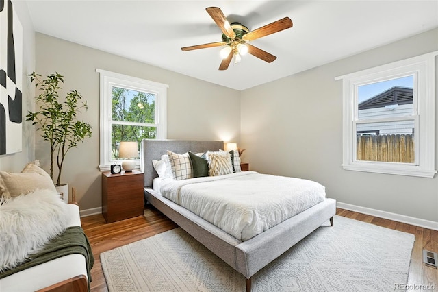2000 S King St, Denver, CO 80219 - bedroom with wood finished floors and ceiling fan