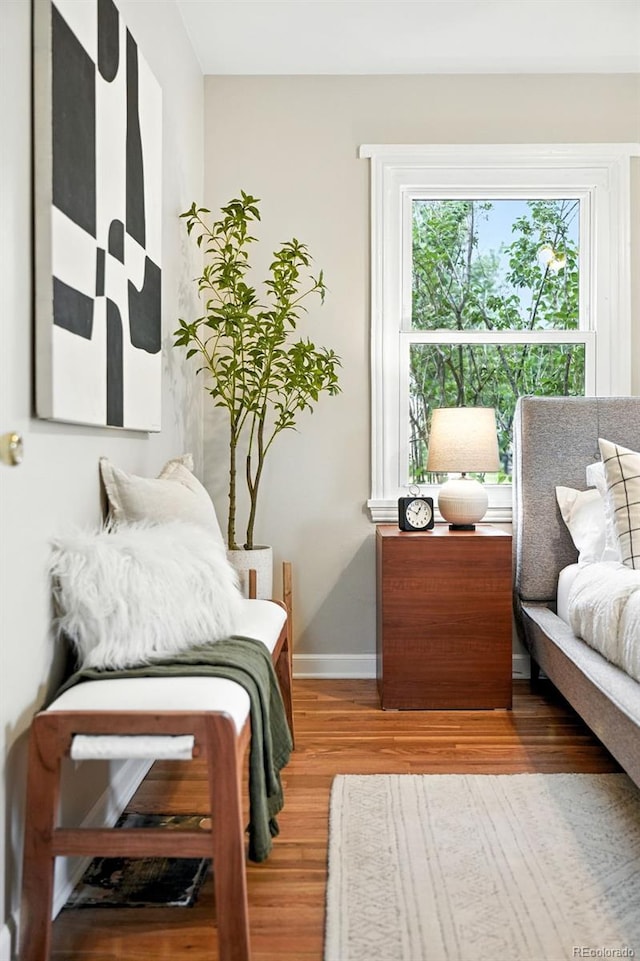 2000 S King St, Denver, CO 80219 - bedroom featuring wood finished floors and baseboards