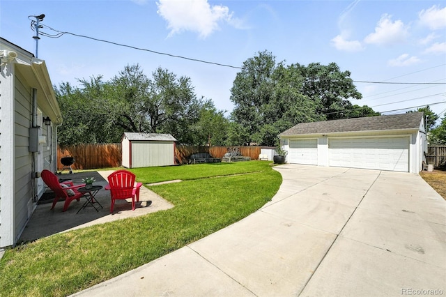 2000 S King St, Denver, CO 80219 - fenced backyard with a detached garage and a storage shed