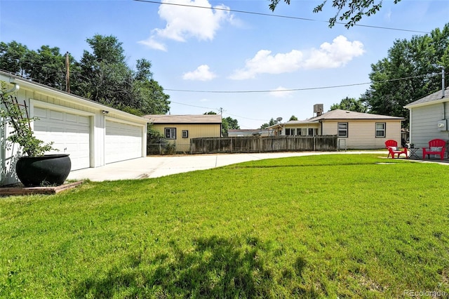 2000 S King St, Denver, CO 80219 - view of yard featuring a detached garage