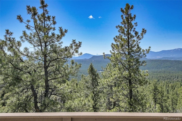 693 Rd C, Pine, CO 80470 - mountain view with a heavily wooded area