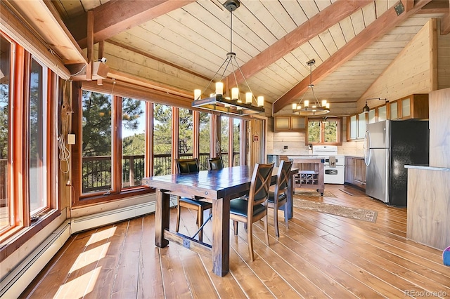 693 Rd C, Pine, CO 80470 - dining area featuring a chandelier, wooden ceiling, light wood finished floors, and a baseboard heating unit