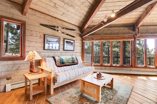 693 Rd C, Pine, CO 80470 - sunroom with a baseboard radiator and plenty of natural light