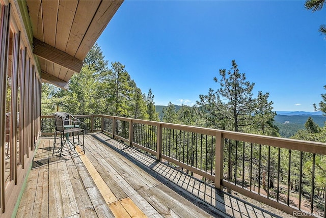 693 Rd C, Pine, CO 80470 - wooden terrace with a mountain view