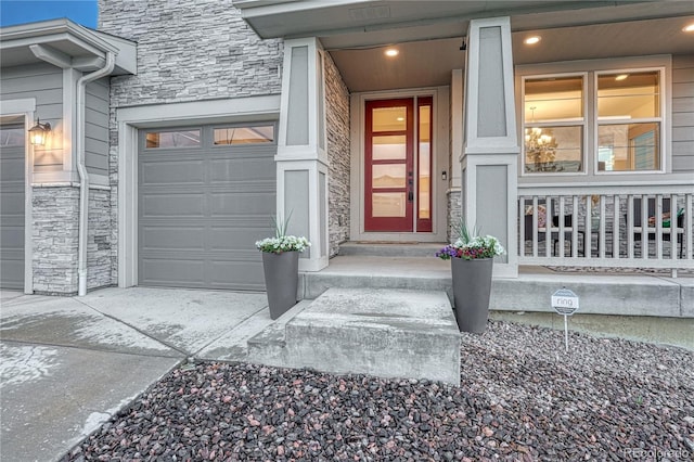 2775 Morningbird Ln, Castle Rock, CO 80109 - doorway to property featuring stone siding and an attached garage