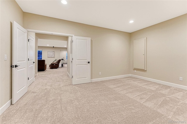2775 Morningbird Ln, Castle Rock, CO 80109 - spare room with light carpet, baseboards, and recessed lighting