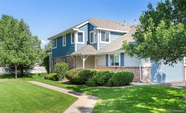 9168 W 50th Ln Unit 1, Arvada, CO 80002 - traditional-style home with brick siding, a garage, a shingled roof, and driveway